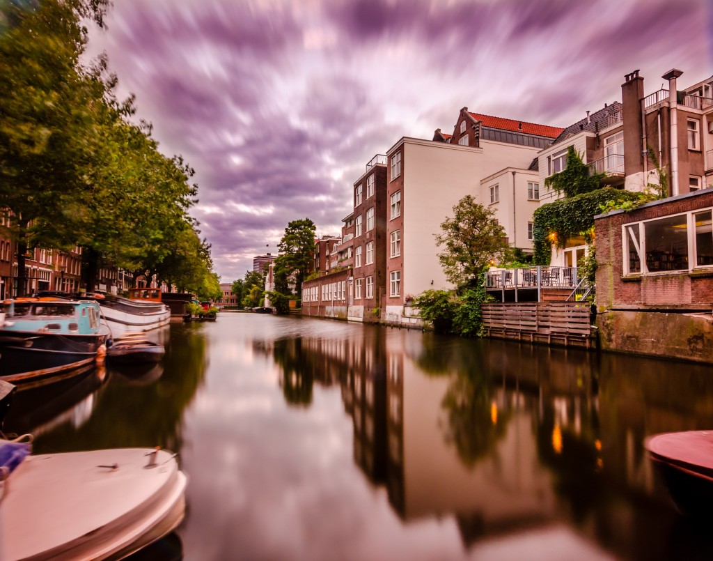 Amsterdam Architecture amid Water and Clouds