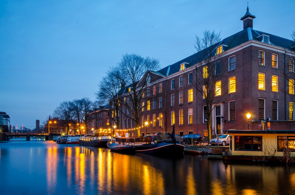 Amsterdam canals illuminated at night