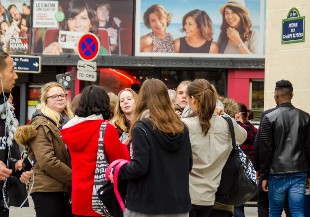 Shoppers on the busy Avenue de Champs Elysees