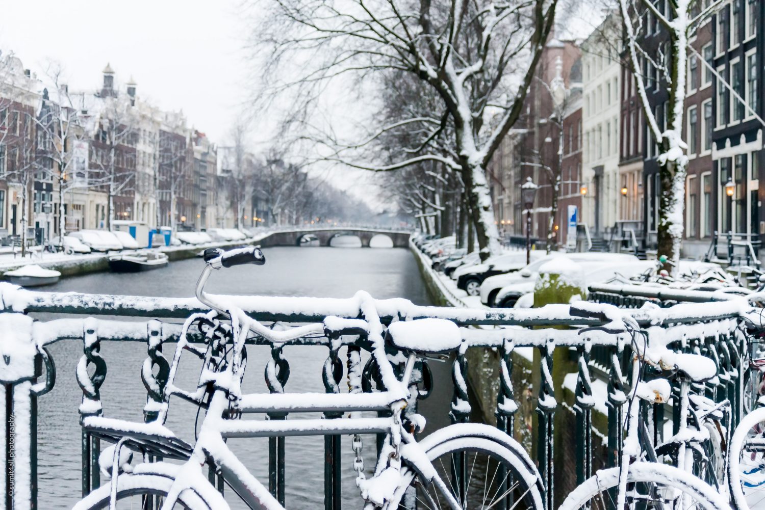 Bikes in Amsterdam After Fresh Snowfall in Winters Bikes in Amsterdam After Fresh Snowfall in Winters
