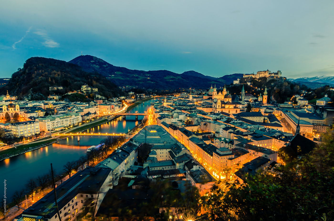 The city of Salzburg after sunset in Austria.