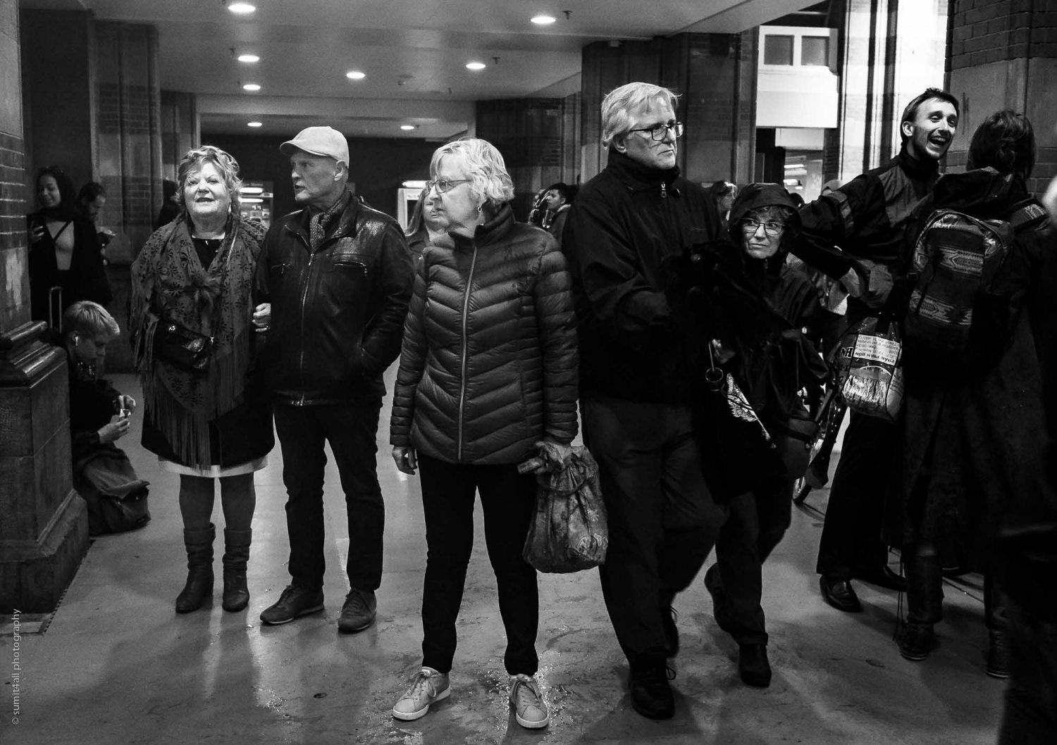 People Taking Cover from Rain in the Amsterdam Centraal Station